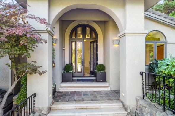 arched stucco entry